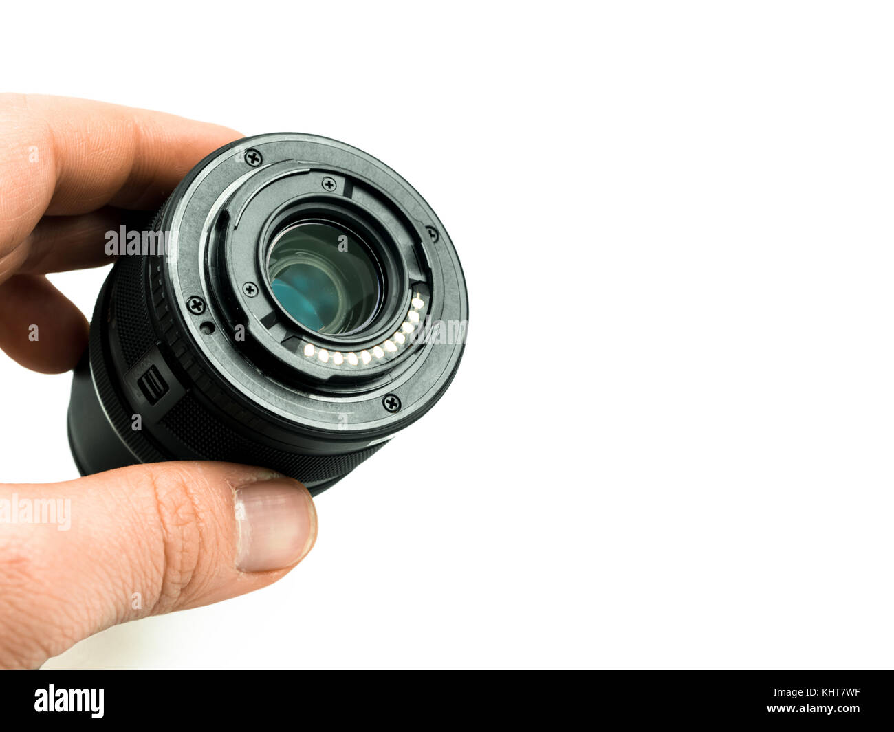 hand held camera lens on white ground Stock Photo Alamy