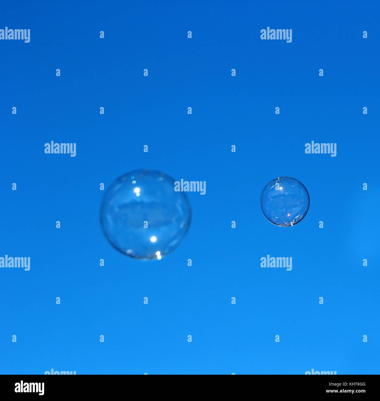 Soap bubble flying against the blue sky Stock Photo - Alamy