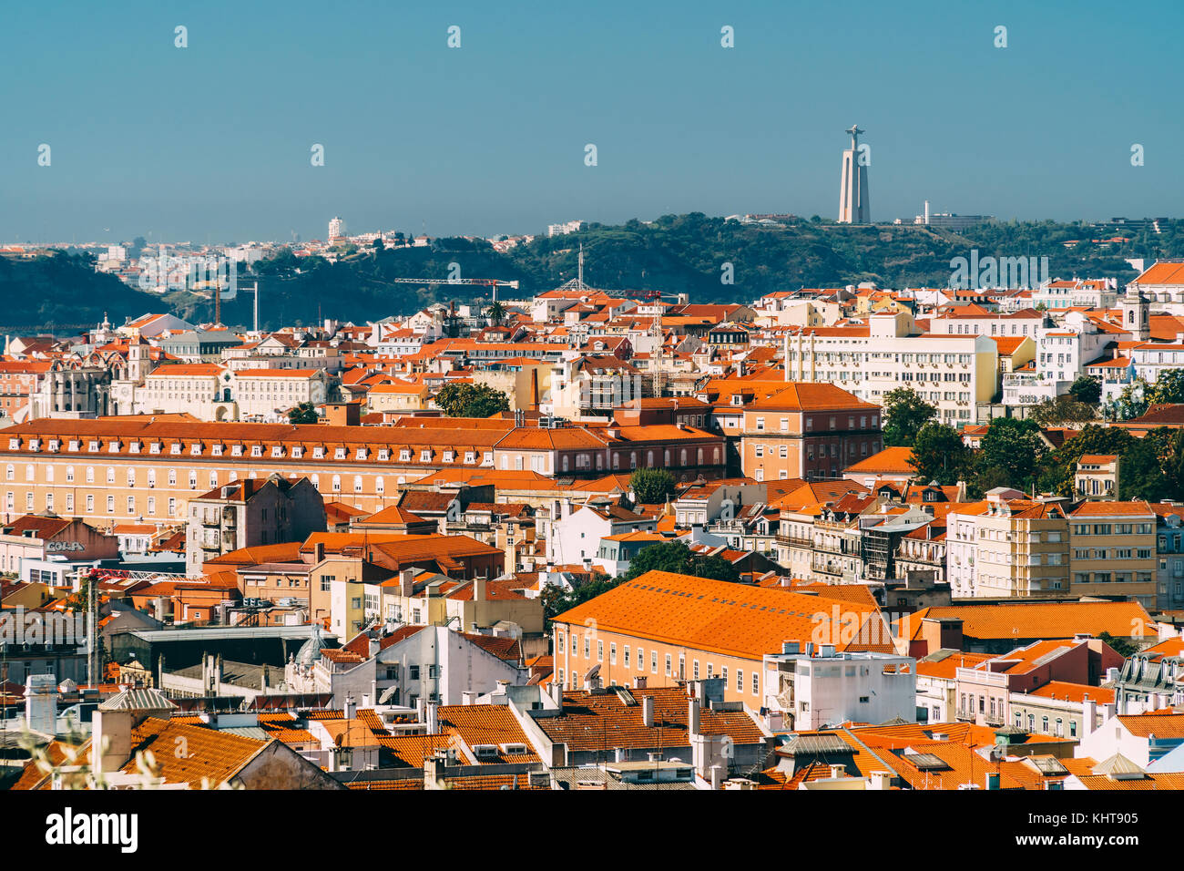 Aerial View Of Downtown Lisbon Skyline Of The Old Historical City And Cristo Rei Santuario (Sanctuary Of Christ the King Statue) In Portugal Stock Photo