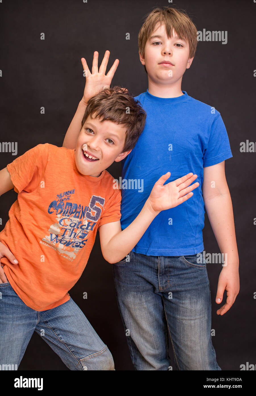 Twin Brothers Hugging Posing In Studio Portrait High-Res Stock Photo -  Getty Images