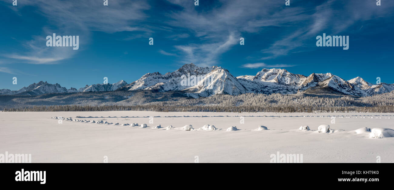 Fence covered with snow and the Sawtooth mountain range Stock Photo - Alamy