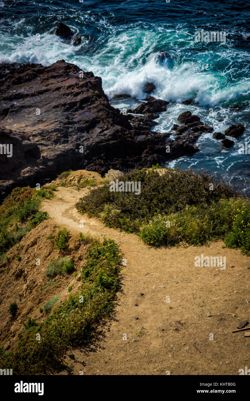 Hiking trail cascading down the treacherous cliffs of Flat Rock Point