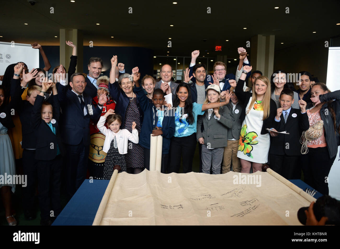 NEW YORK, USA - JUNE 08:  UN Ocean Conference in New York UNHQ PRINCE ALBERT II  AND ADRIAN GRANIER   sign  ocean pledge with children from around the world  at the United Nations (UN) Headquarters in New York, NY, United States on June 08, 2017    People:  Adrian Grenier Stock Photo