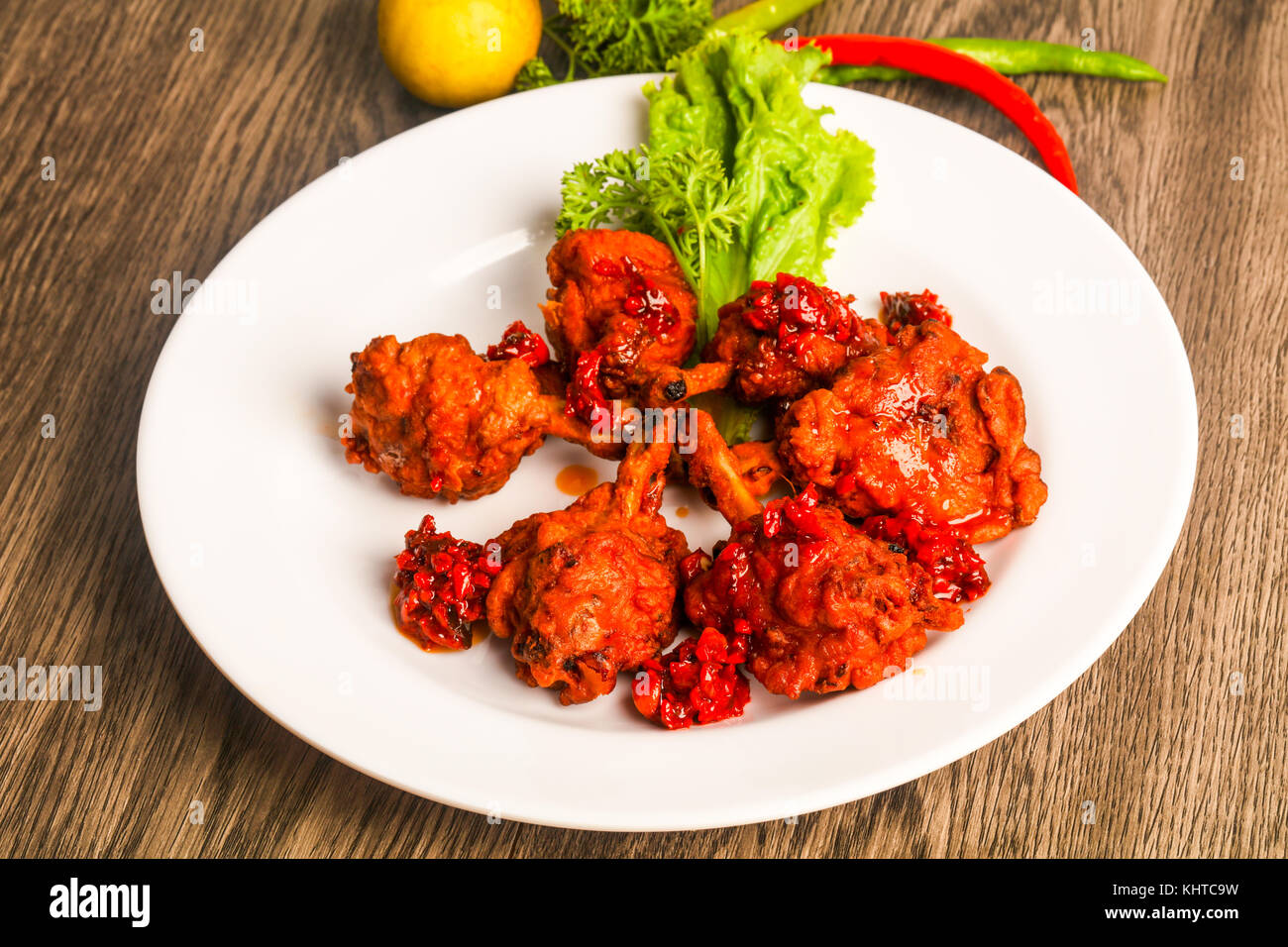 Indian traditional cuisine Chicken lollipops with spices Stock Photo