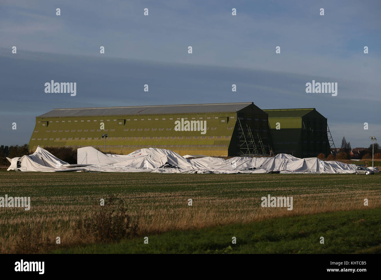 Airlander 10, the world's largest aircraft, lies on the ground at Cardington airfield in Bedfordshire, after the aircraft came loose from its moorings causing its hull to rip and deflate. Stock Photo