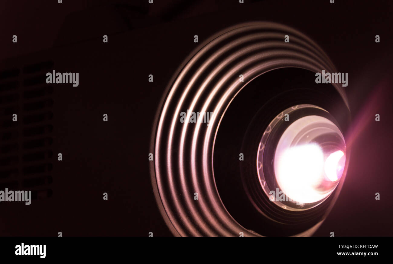 Photograph of a lighted projector lens Stock Photo Alamy