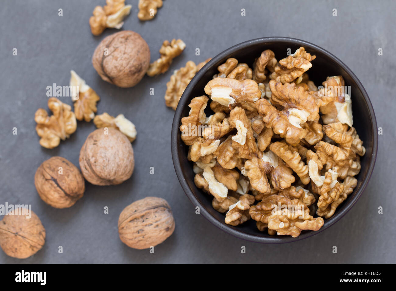 wallnuts composition on black slate background Stock Photo