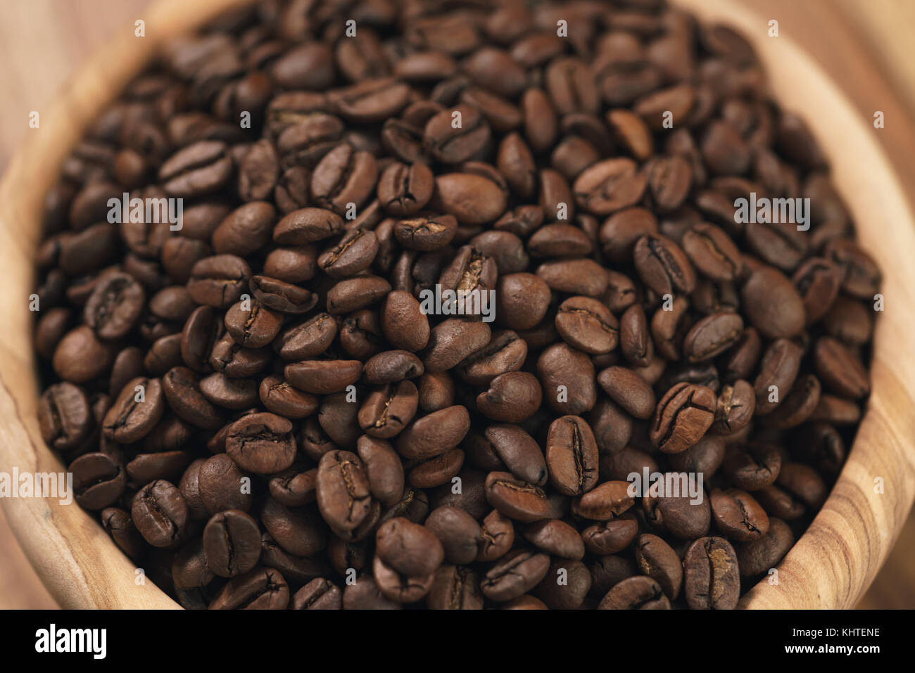 roasted coffee beans in wood bowl Stock Photo - Alamy