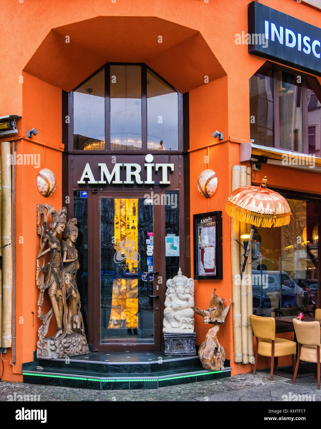 Berlin Schöneberg. Amrit Indian Restaurant. Colourful entrance with scultural details on street corner Stock Photo
