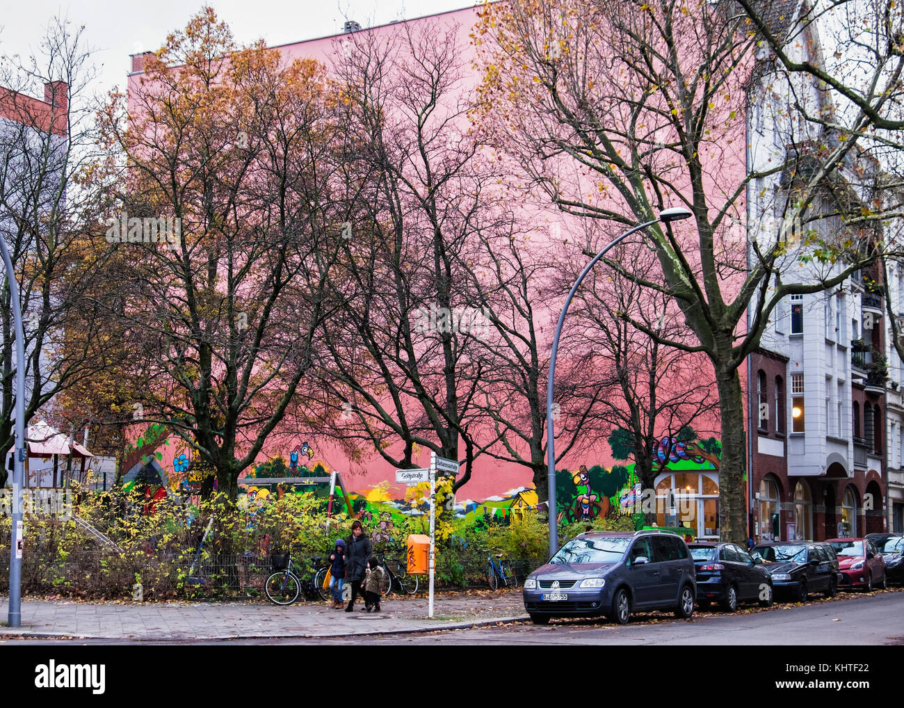 Berlin Schöneberg.Colourful childrens playground with painted artwork on street corner Stock Photo