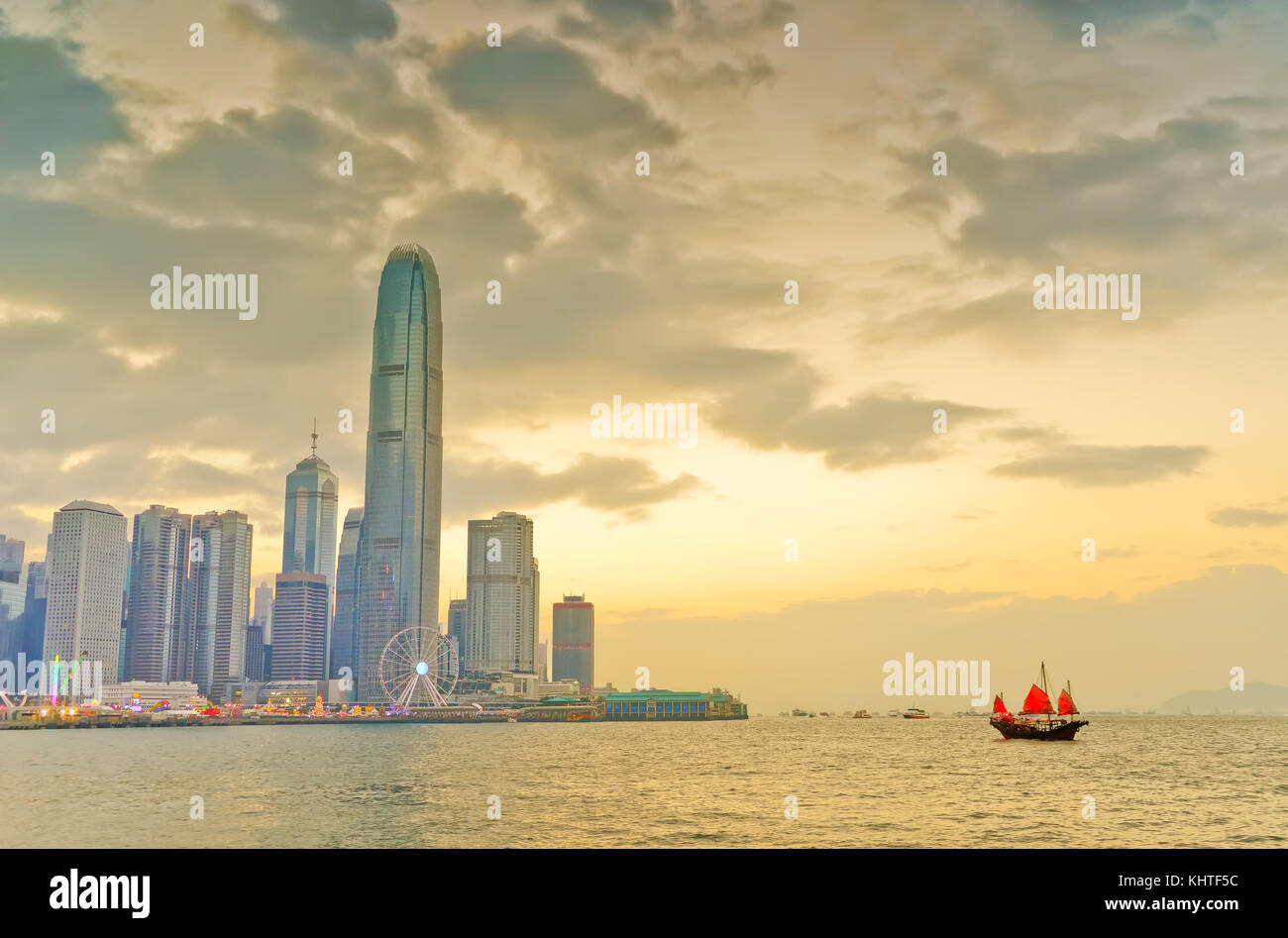 Victoria Harbor and Hong Kong skyline at sunset Stock Photo - Alamy