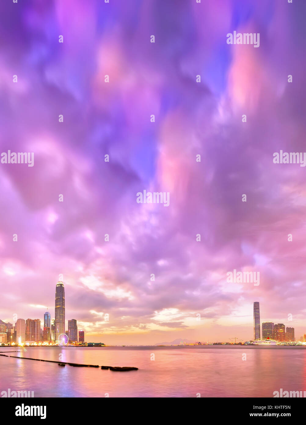 Victoria Harbor and Hong Kong skyline at dusk Stock Photo - Alamy