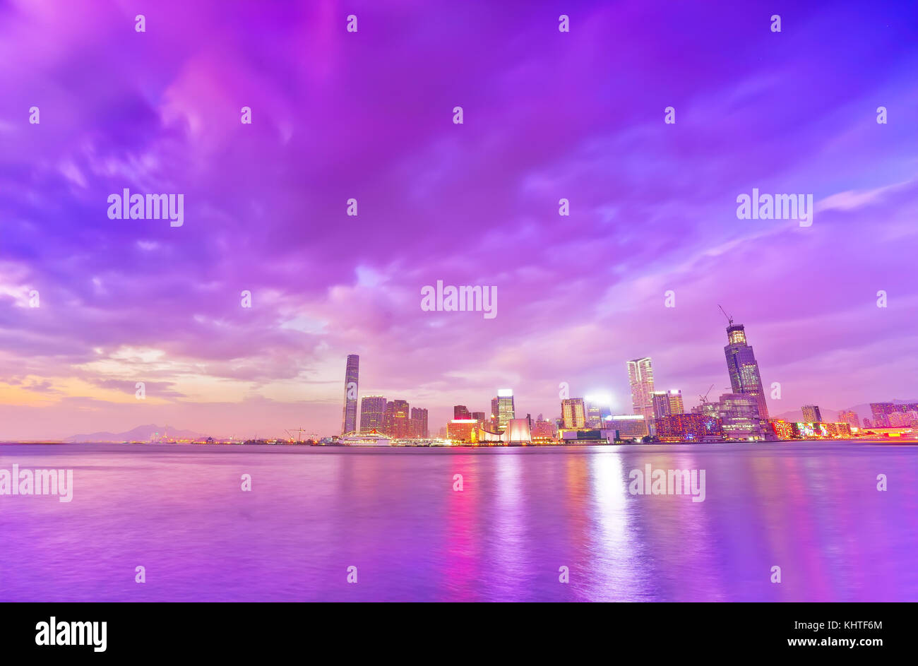 Victoria Harbor and Hong Kong skyline at dusk Stock Photo - Alamy