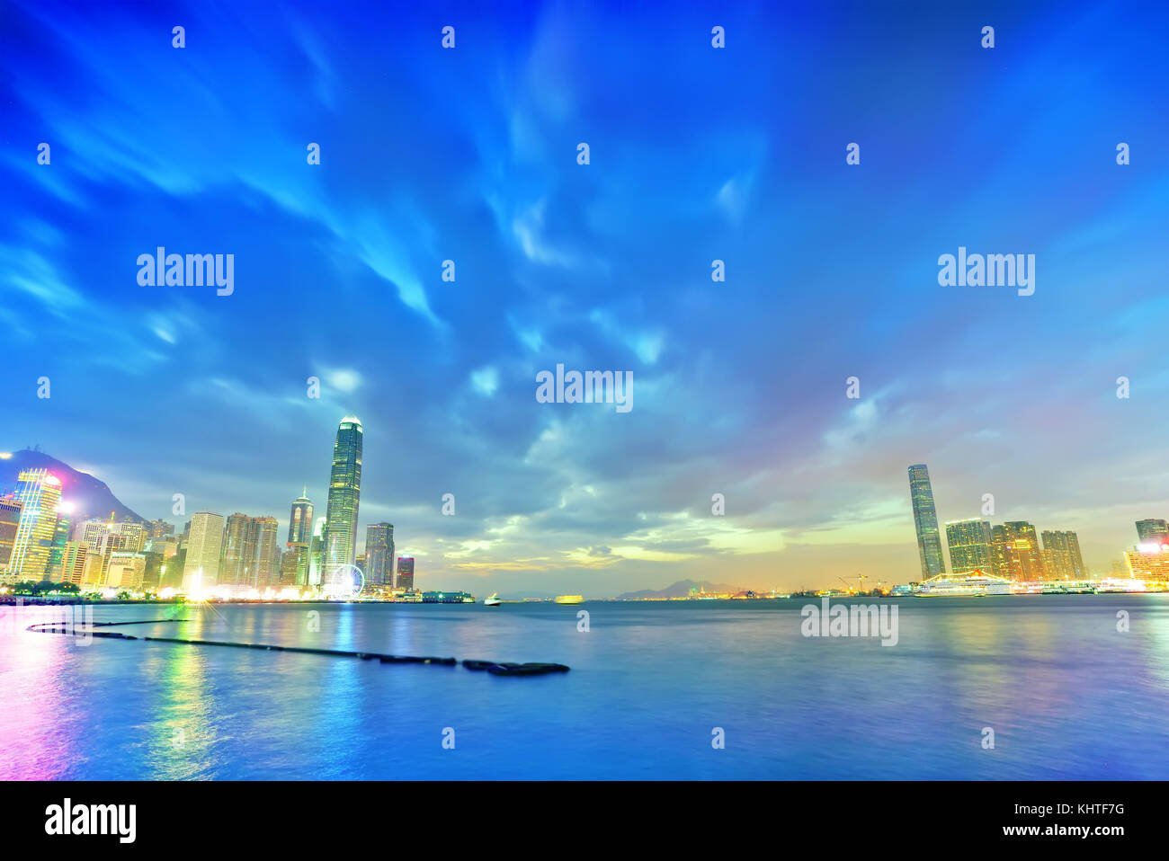 Victoria Harbor and Hong Kong skyline at dusk Stock Photo - Alamy