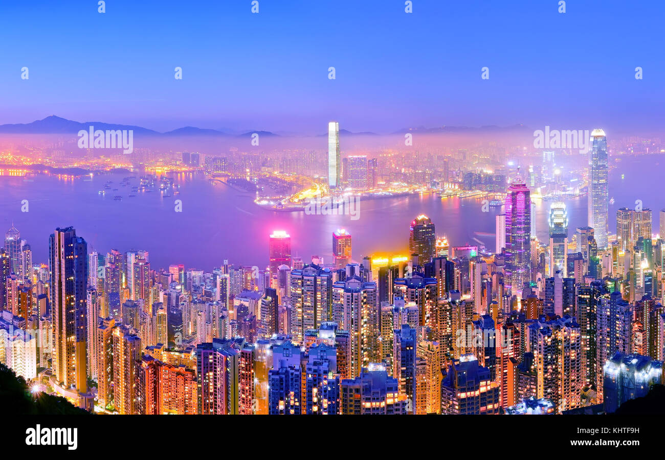 Victoria Harbor and Hong Kong skyline at dusk Stock Photo - Alamy