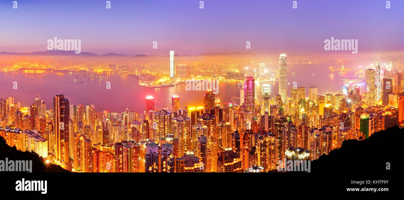 Victoria Harbor and Hong Kong skyline at dusk Stock Photo - Alamy