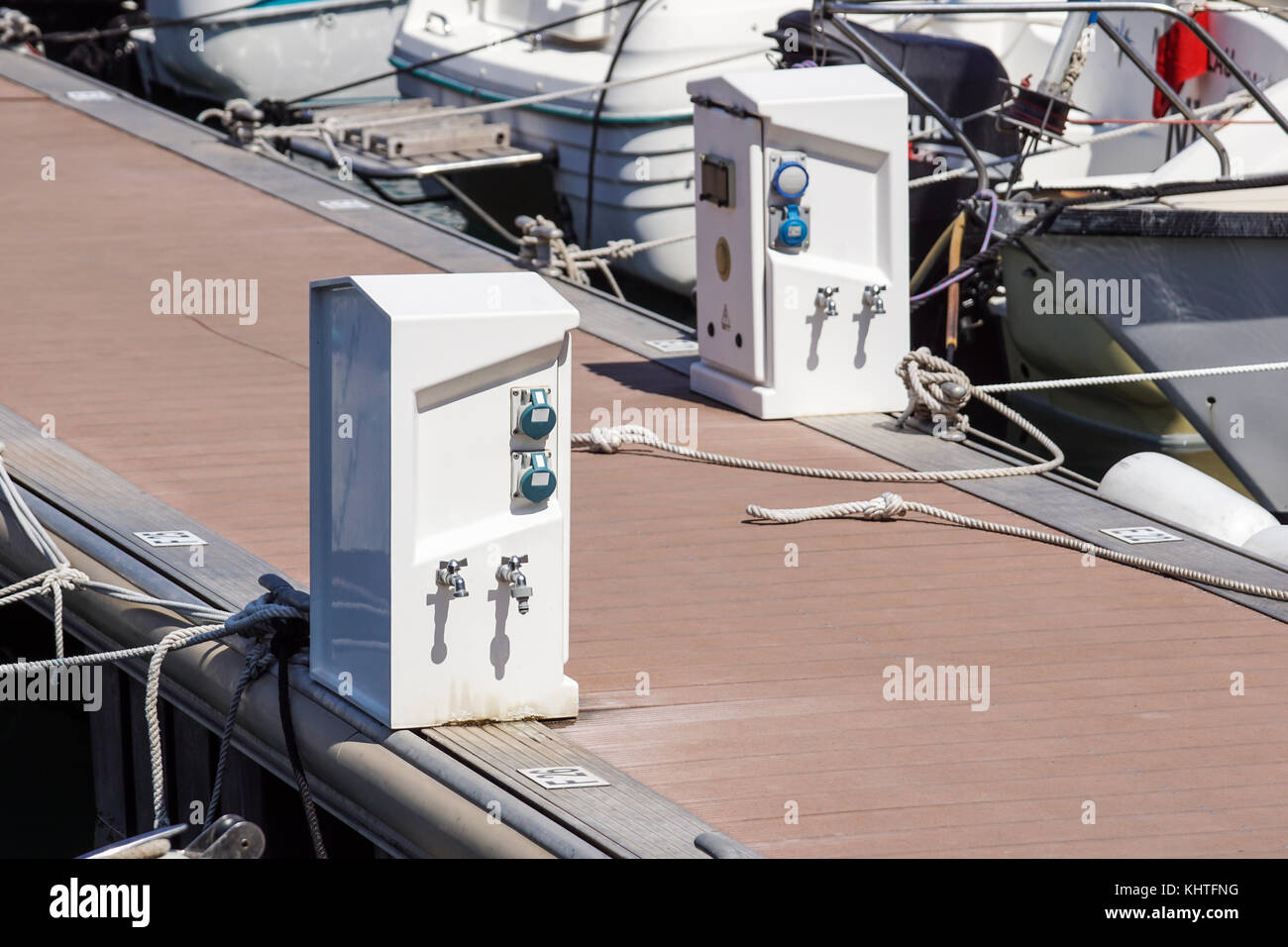 Shore Based Electricity Supply Appliance Power Supply And Battery Charged on the dock Stock