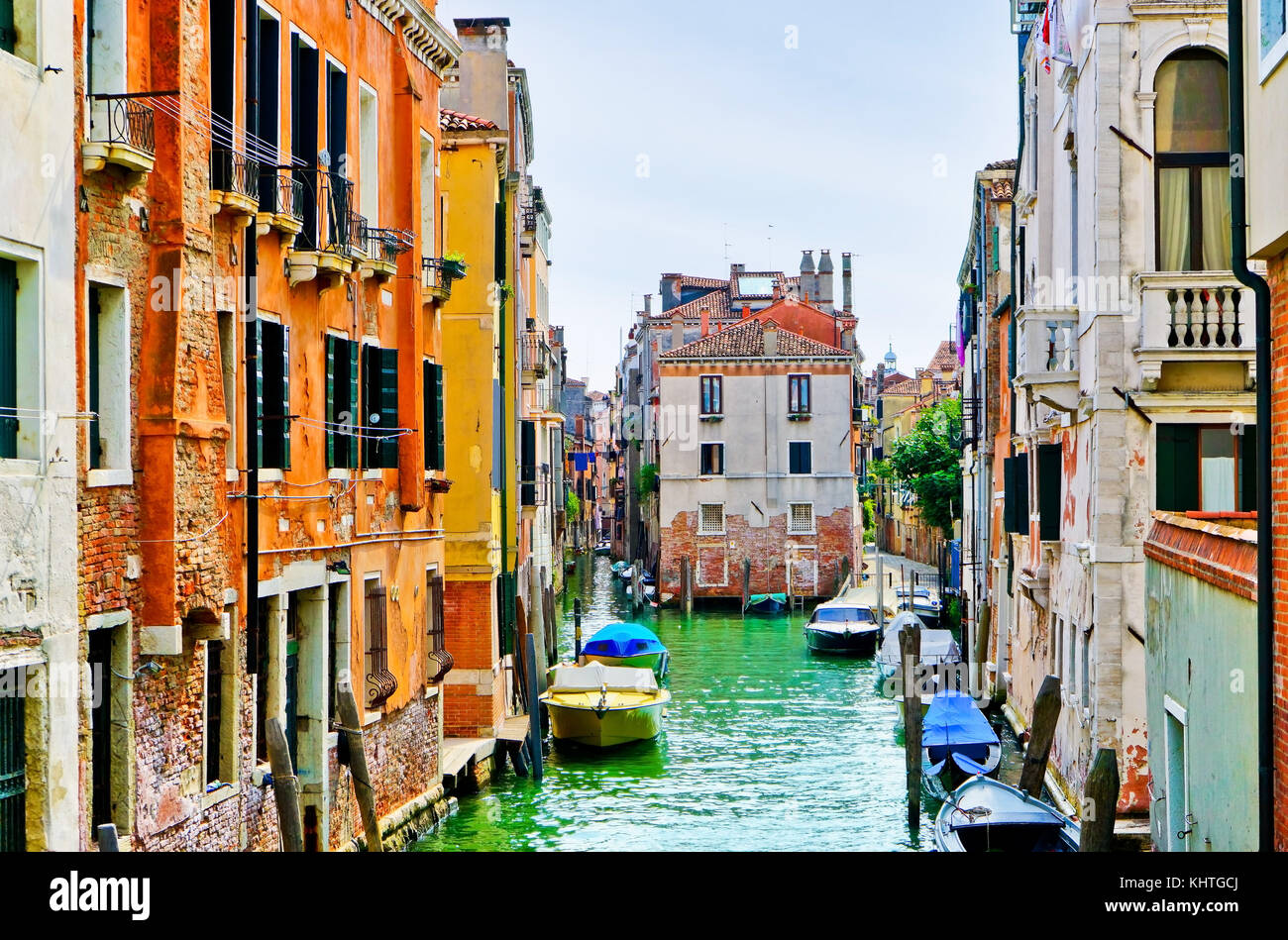 View of the colorful Venetian houses along the canal in Venice, Italy ...