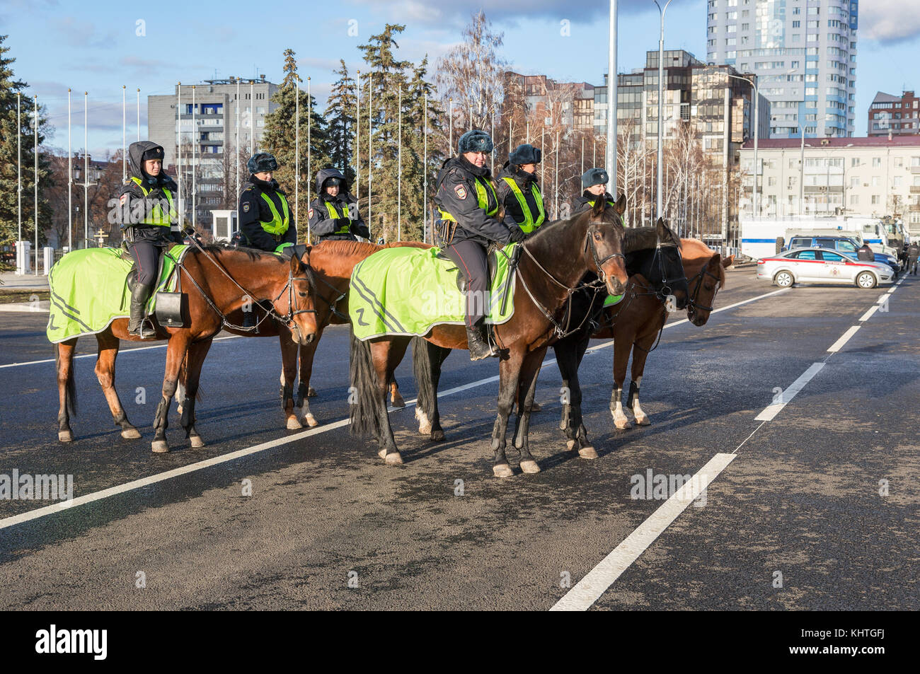 Samara, Russia - November 16, 2017: Female mounted police on horse back at the city street Stock Photo