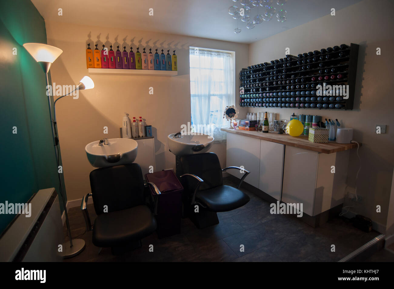 Interior of a modern hair salon, this is the colour department where