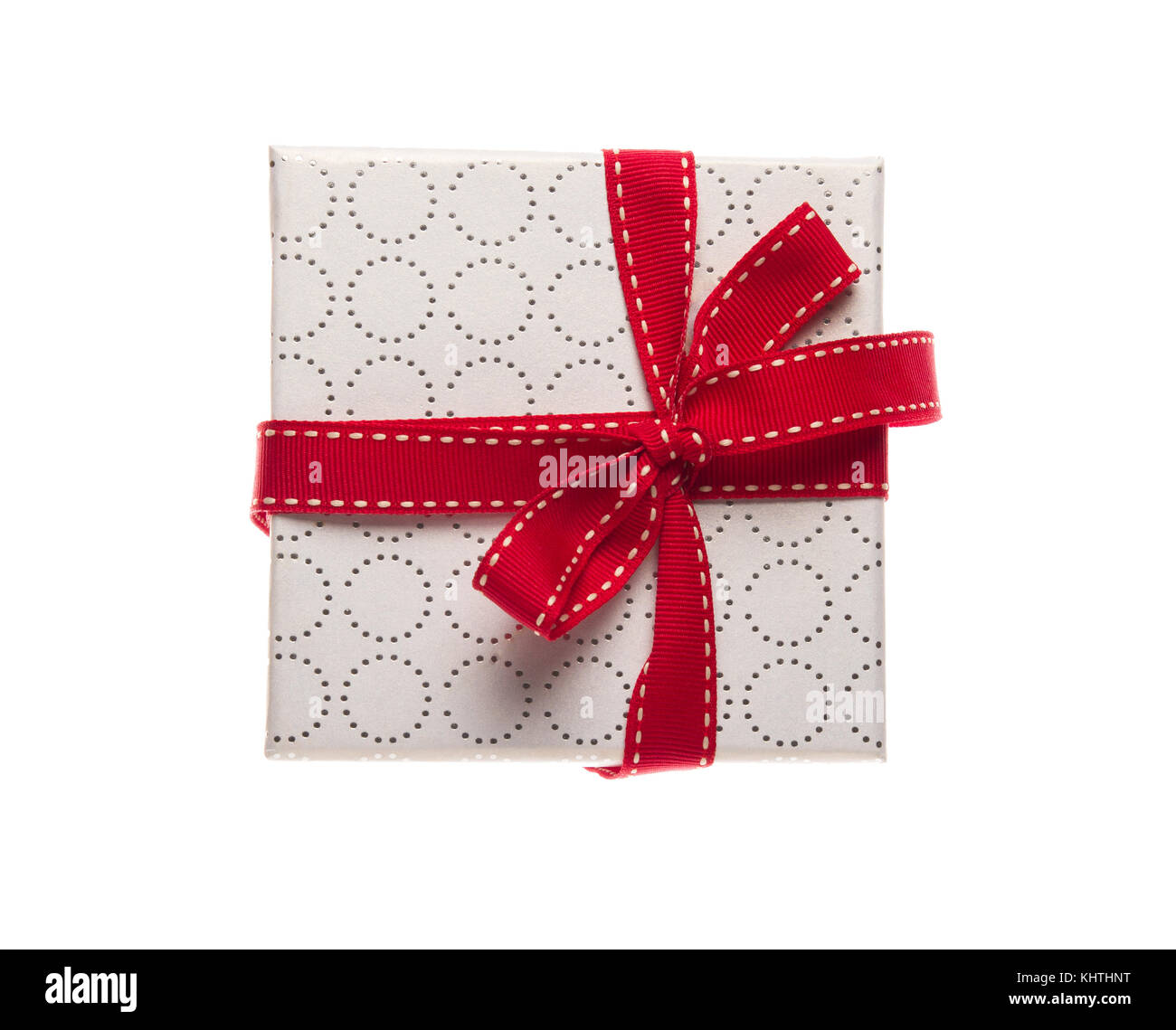 Gift box with red ribbon isolated on white Stock Photo - Alamy