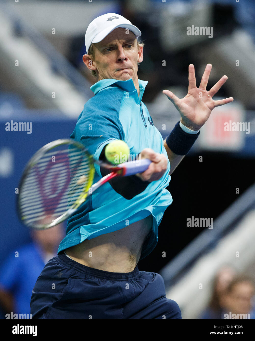 South African  tennis player KEVIN ANDERSON (RSA) plays forehand shot during men's singles match at US Open 2017 Tennis Championship, New York City, Stock Photo