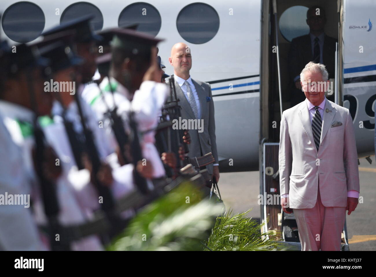 The Prince of Wales receiving a guard of honour as he arrives on the island of Dominica, as he continues his tour of hurricane-ravaged Caribbean islands. Stock Photo