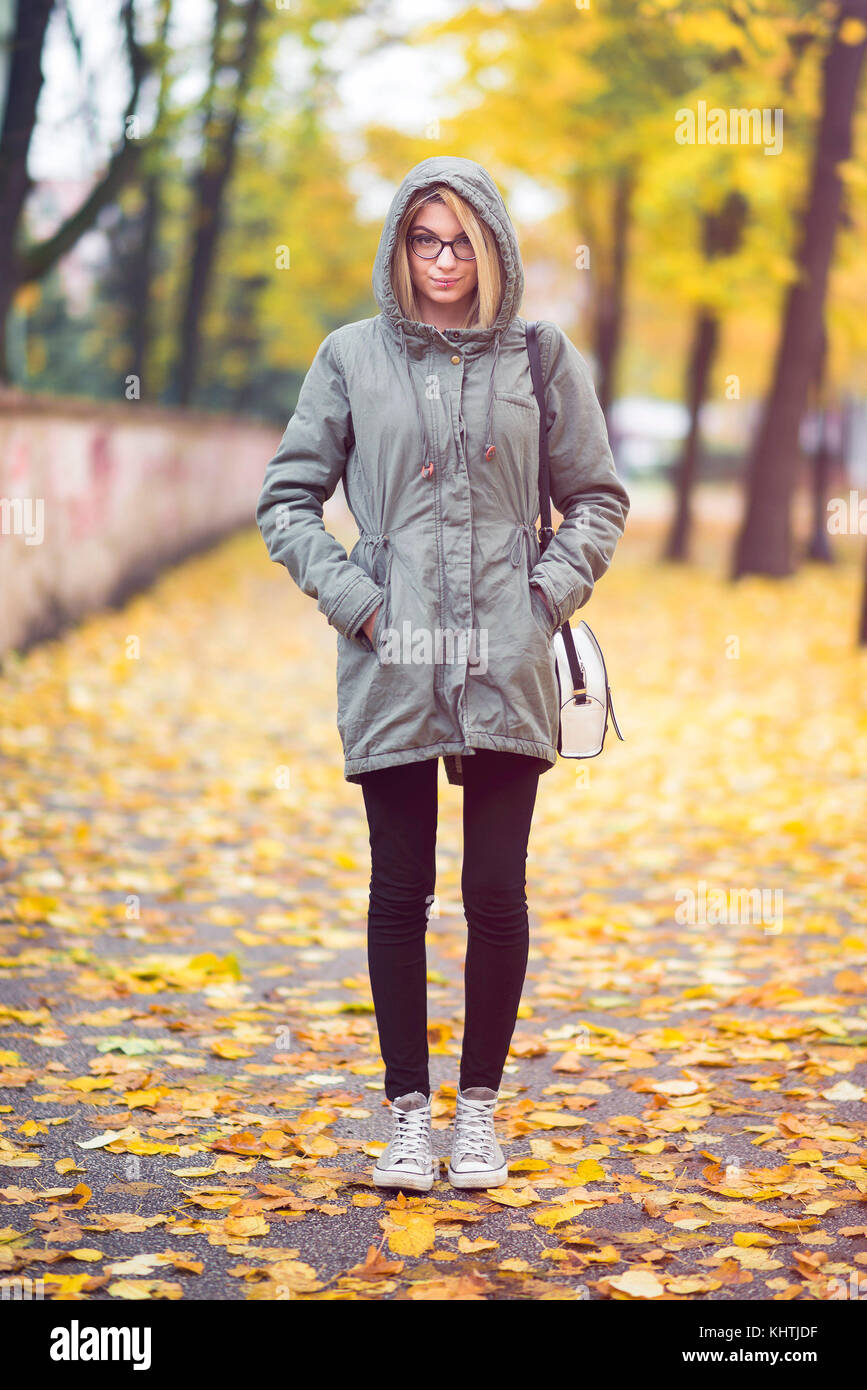 Young hipster woman with glasses in autumn Stock Photo