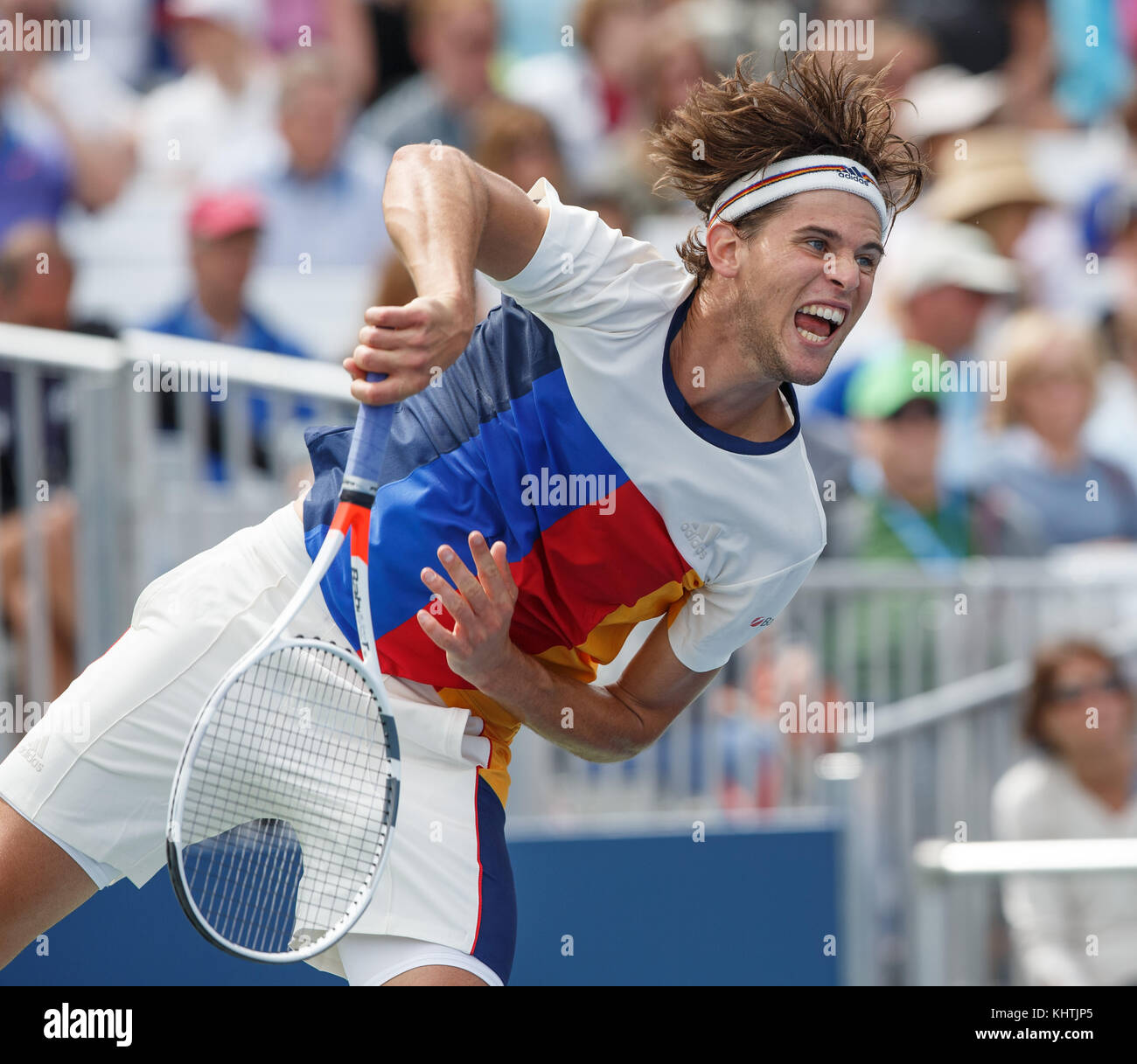 Austrian tennis player DOMINIC THIEM (AUT) serving during men's singles match at US Open 2017 Tennis Championship, New York City, New York State, Unit Stock Photo