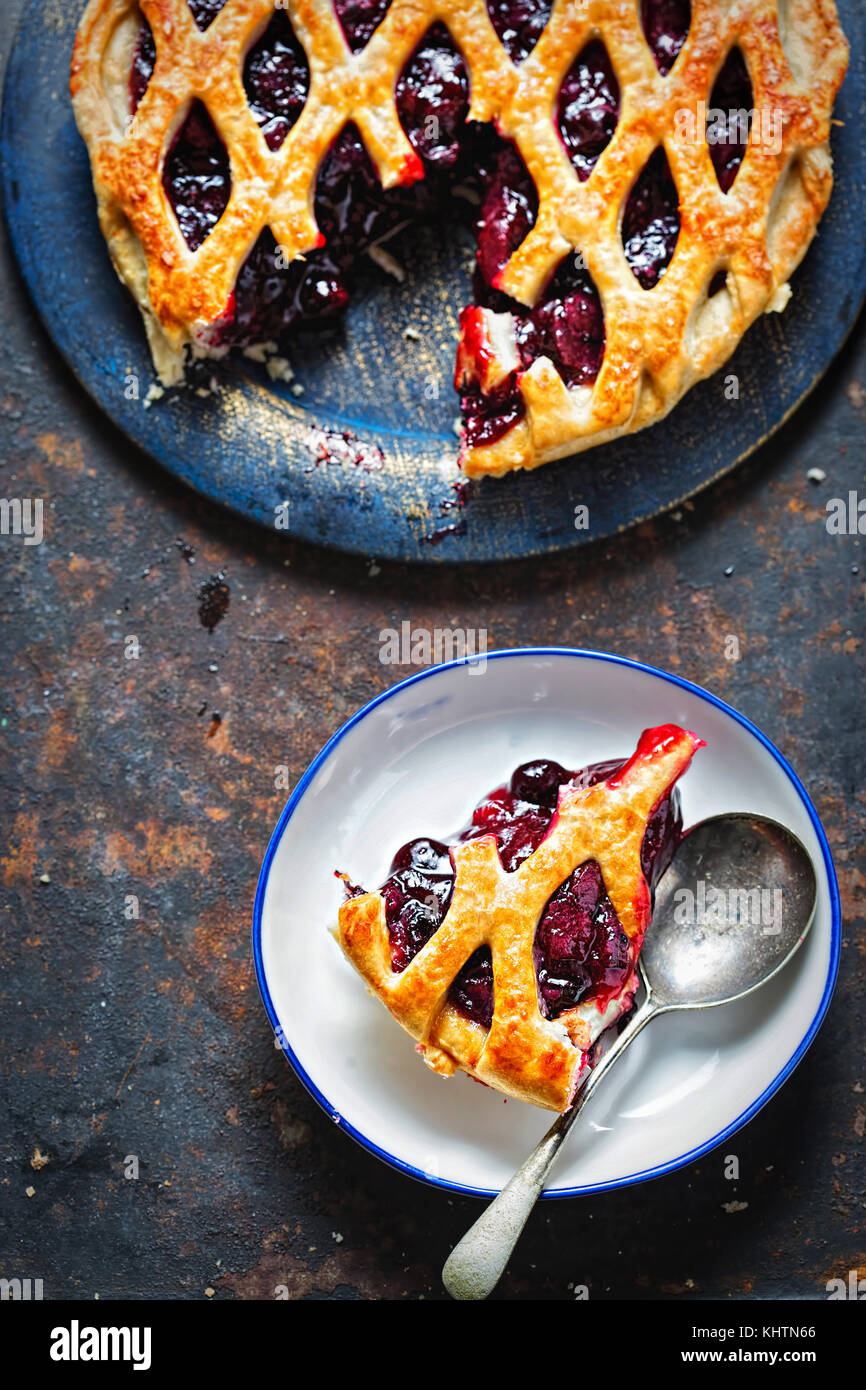 Lattice autumn fruit pie, with blackcurrant, blackberry, cherry compote