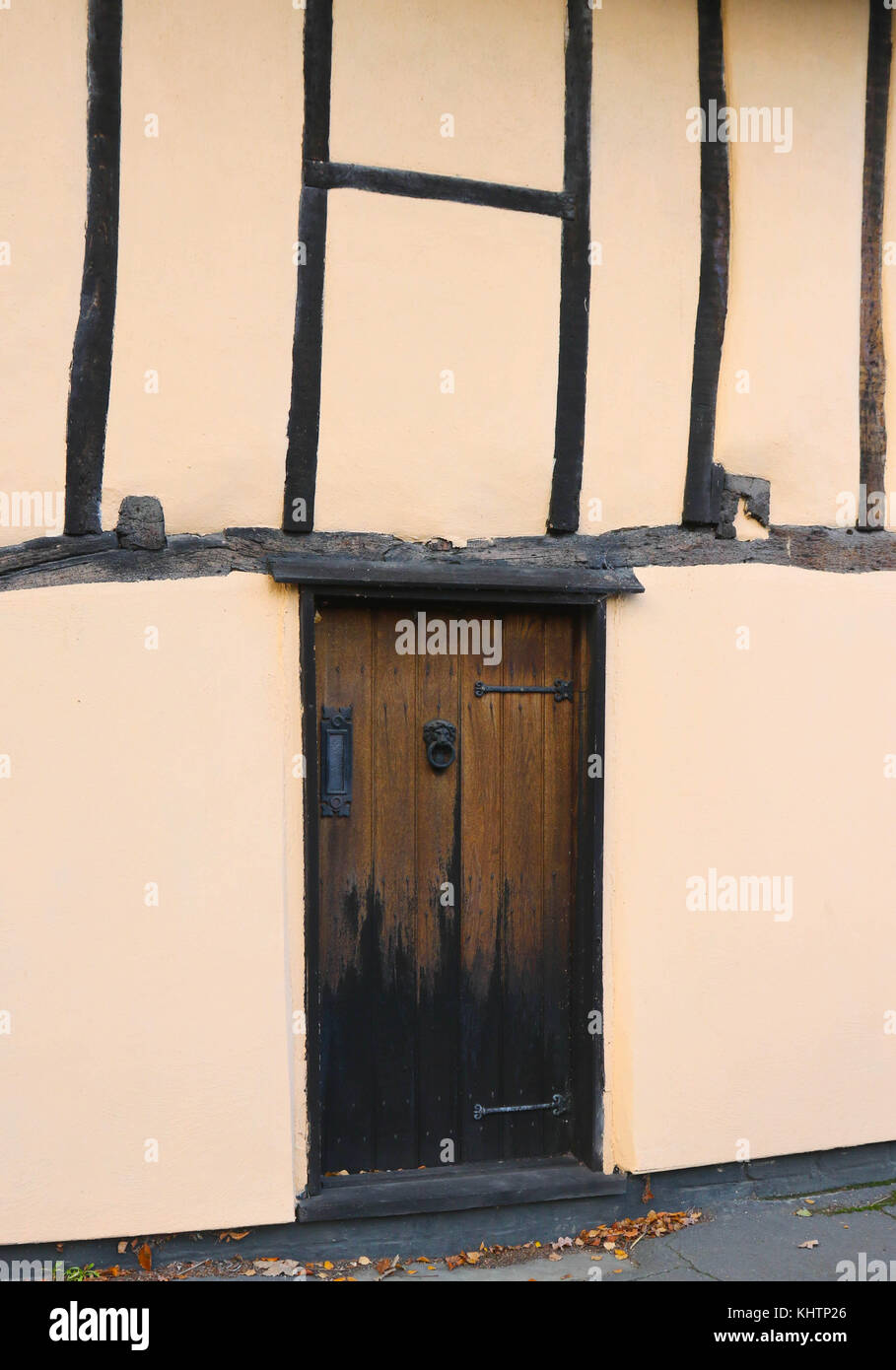 The brown door of a half-timbered cottage in Great Abington, Cambridge, UK Stock Photo