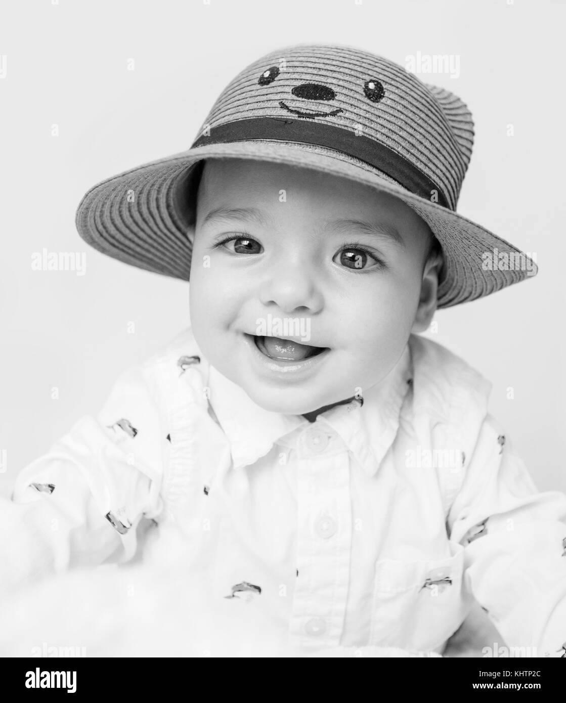 baby boy with straw hat Stock Photo Alamy