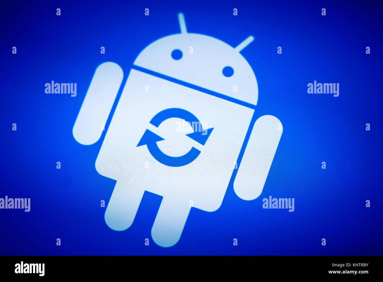 Android robot logo icon on the smart phone screen during update  installation Stock Photo - Alamy
