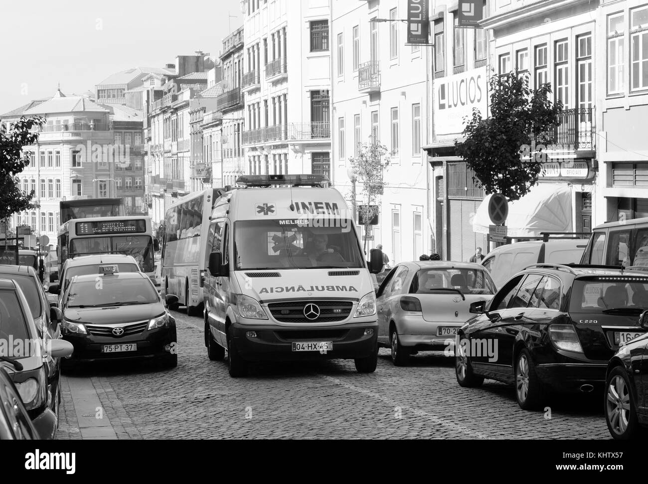 September 2017 - Emergency ambulance on a fast run in the streets of Porto, Portugal, Stock Photo