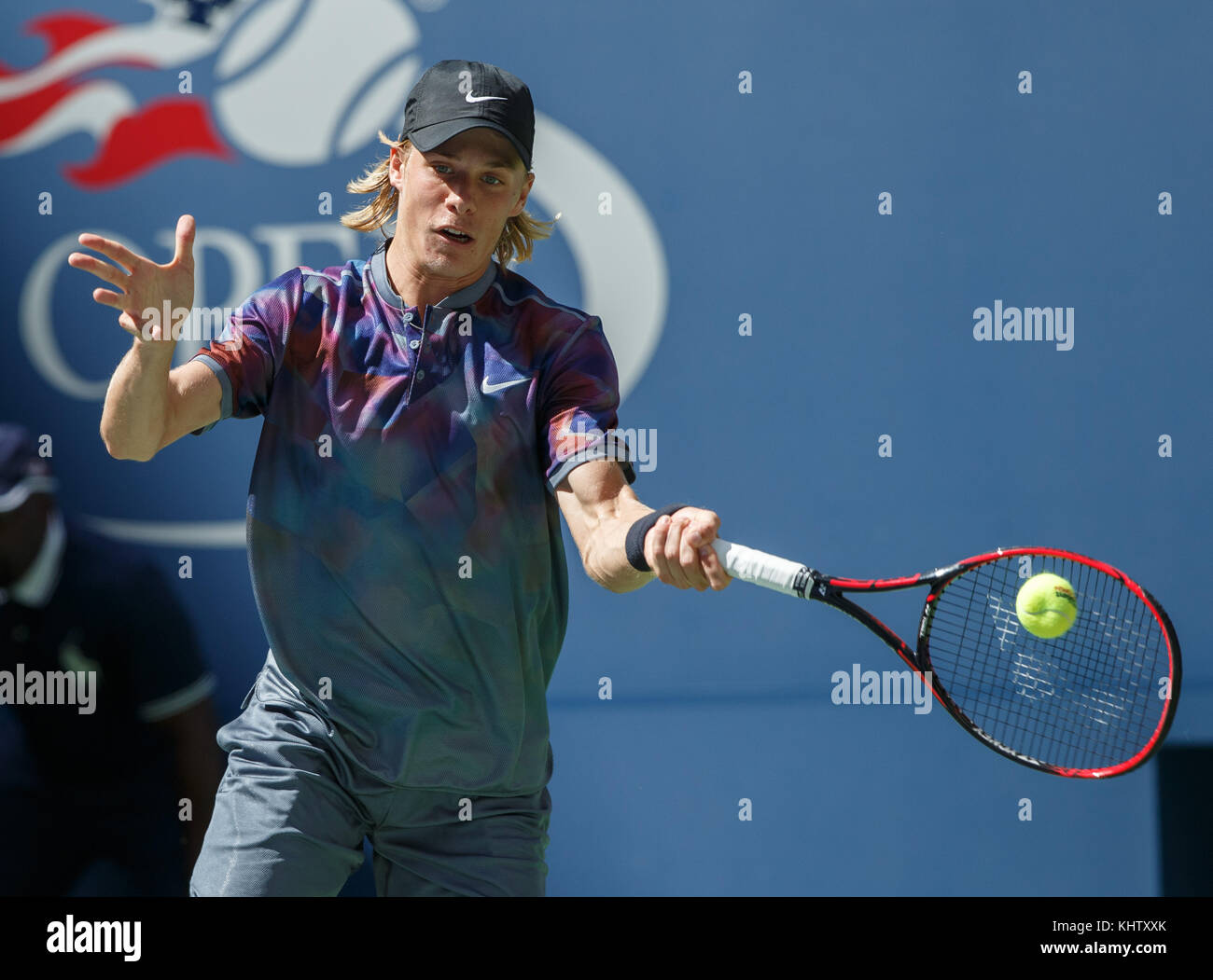 Canadian tennis player DENIS SHAPOVALOV plays forehand shot during men