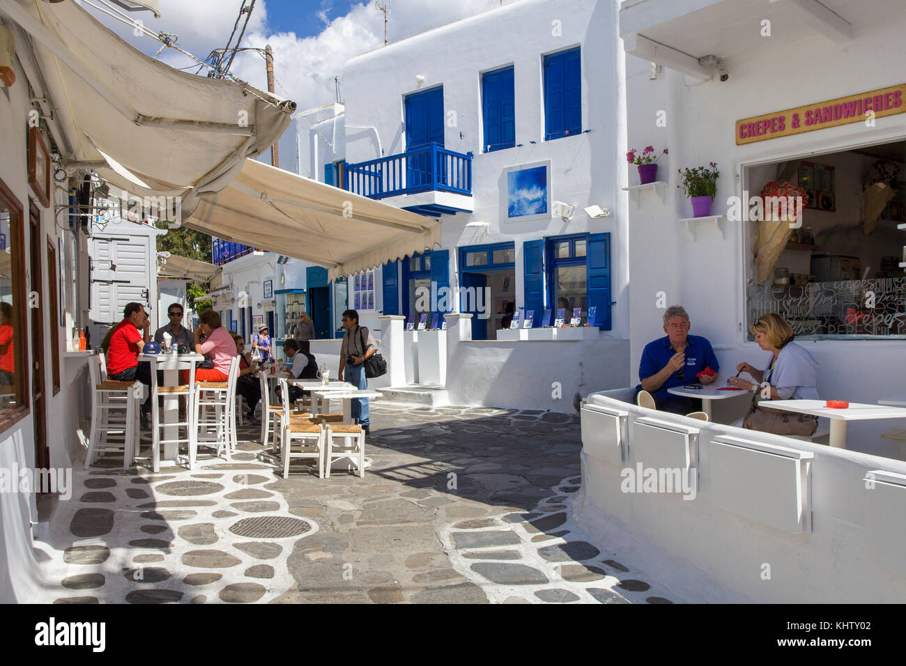 Street coffee shop at a alley of Mykonostown, Mykonos island, Cyclades, Aegean, Greece Stock
