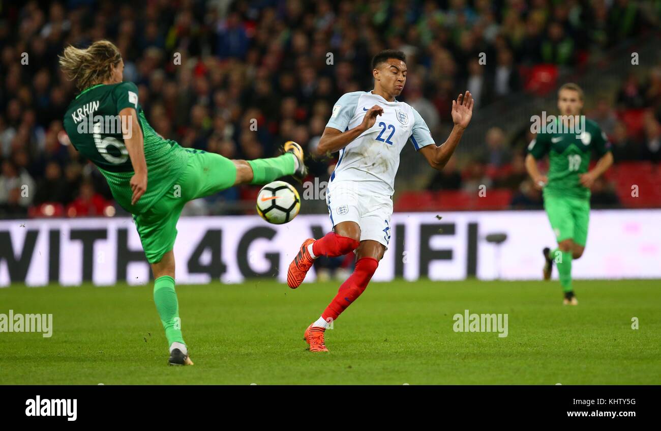 Jesse Lingard of England challenges Rene Krhin of Slovenia during the FIFA World Cup Qualifier match between England and Slovenia at Wembley Stadium in London. 05 Oct 2017 *** EDITORIAL USE ONLY *** No merchandising. For Football images FA and Premier League restrictions apply inc. no internet/mobile usage without FAPL license - for details contact Football Dataco Stock Photo