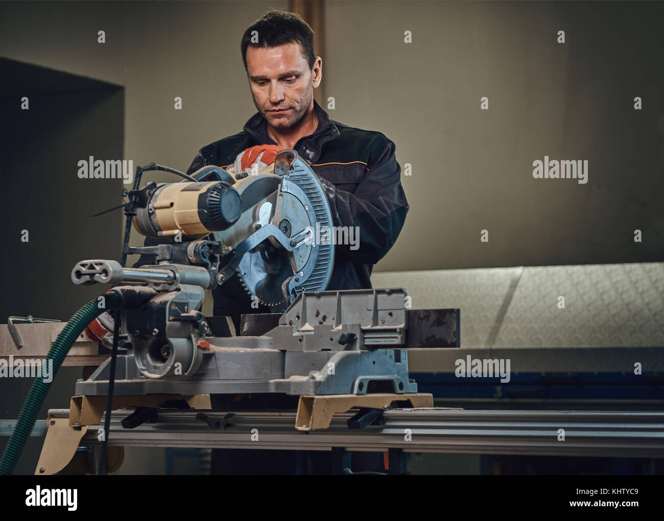 A man works with circular saw Stock Photo - Alamy