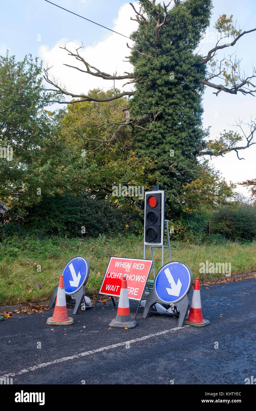 Temporary traffic lights at roadworks in Cheshire UK Stock Photo - Alamy