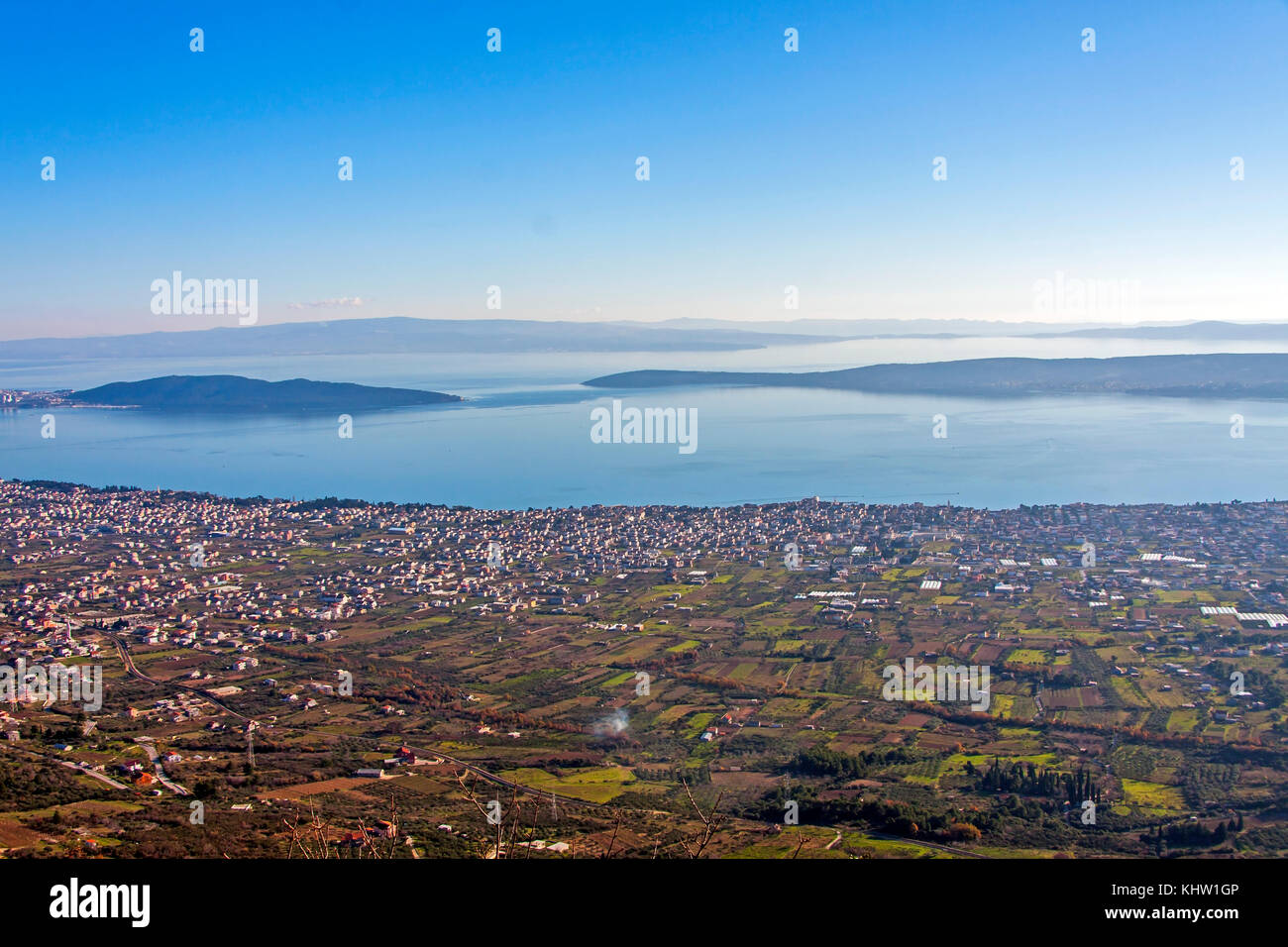 Kastela is one name for 7 single, but connecting villages at the coast of bay Kastela between town Trogir and Split. Croatia, shot from mountain Kozja Stock Photo