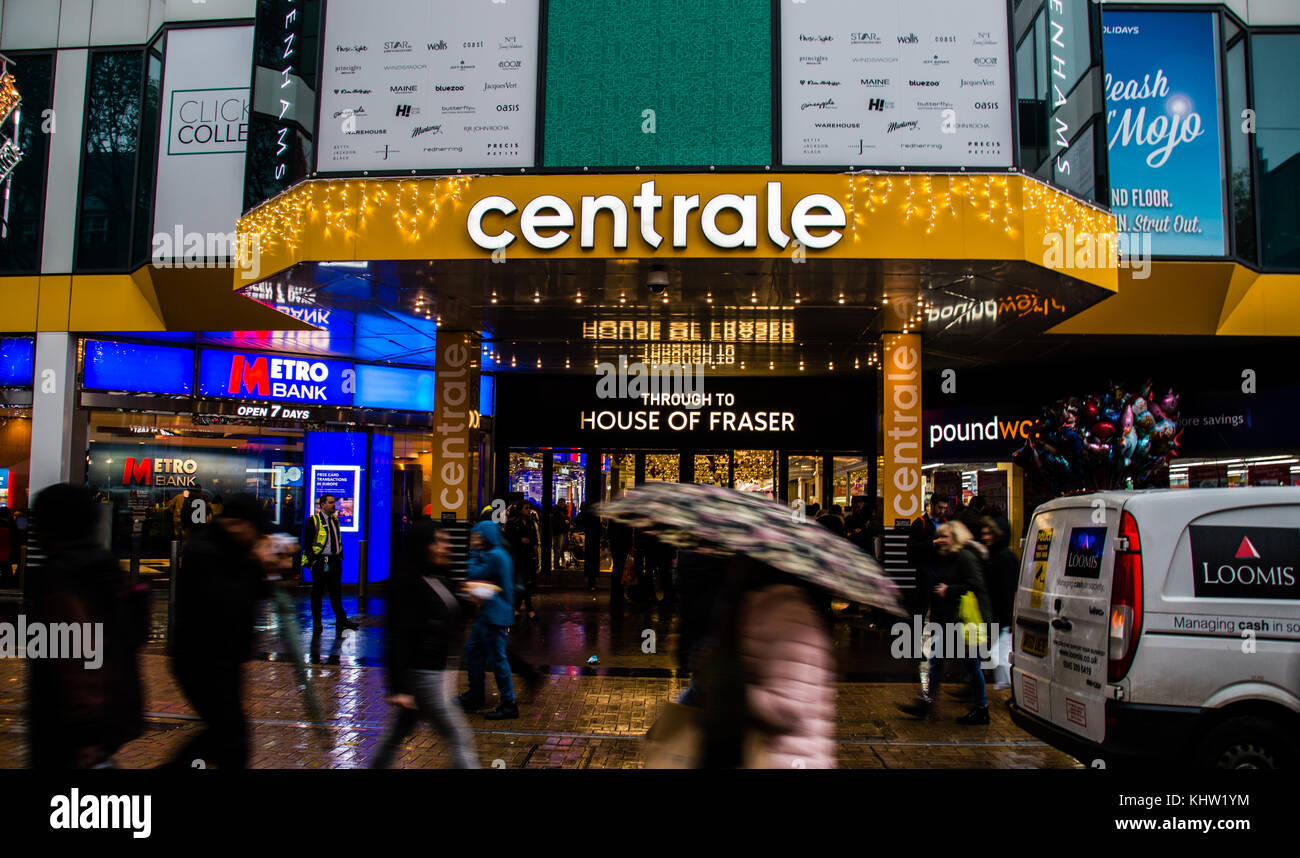 Croydon high street shops with Christmas lights ON showing the Whitgift