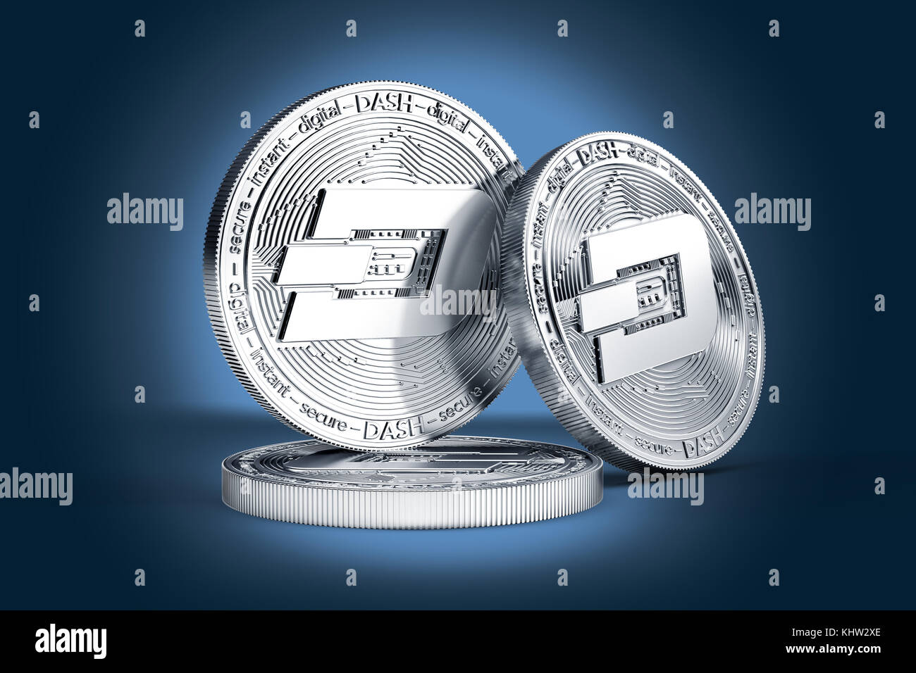 Three Dash concept physical coins displayed on gently lit dark blue background. 3D rendering. New virtual money Stock Photo