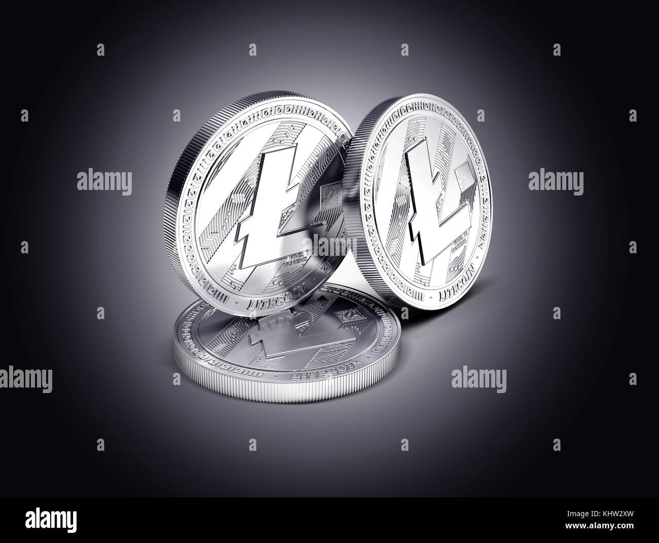 Three Litecoin physical concept coins displayed on gently lit dark background. 3D rendering. New virtual money Stock Photo