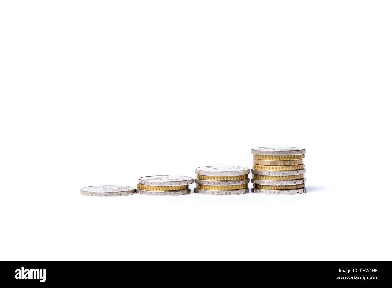 Rising stacks of Euro coins on white background with concept of increasing income Stock Photo