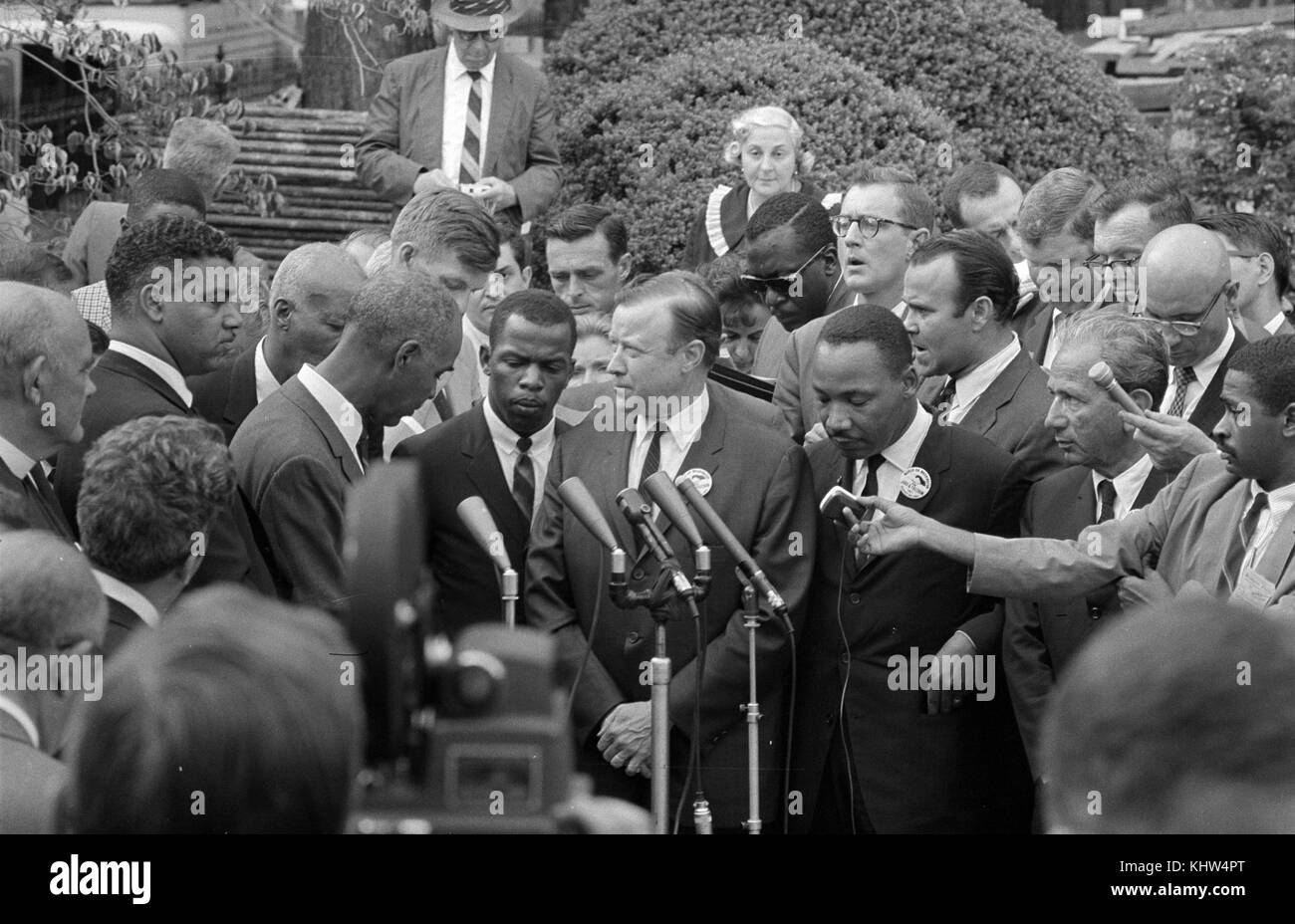 Photograph of Civil Rights leaders talking with reporters after meeting with President John F. Kennedy (1917-1963) after the March on Washington. Dated 20th Century Stock Photo