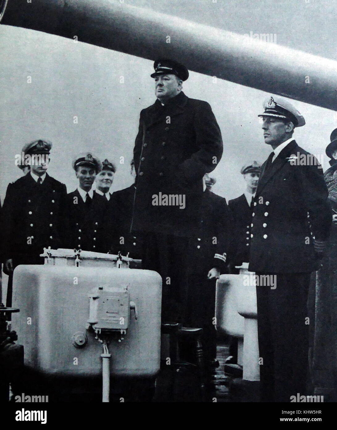 Photograph of Sir Winston Churchill addressing the crew of H.M.S. Exeter on their return from the sinking of the German cruiser Admiral Graf Spee at the Battle of the River Plate. Sir Winston Leonard Spencer-Churchill (1874-1965) a British politician and Prime Minister of the United Kingdom. Dated 20th Century Stock Photo