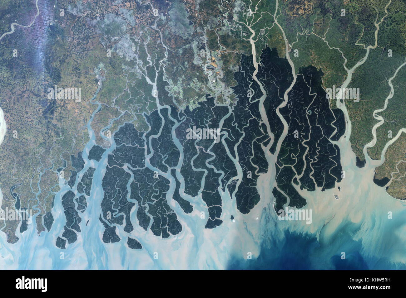 Aerial photograph taken of the Sundarbans. The Sundarbans is a vast forest in the coastal region of the Bay of Bengal, one of the natural wonders of the world. Dated 20th Century Stock Photo