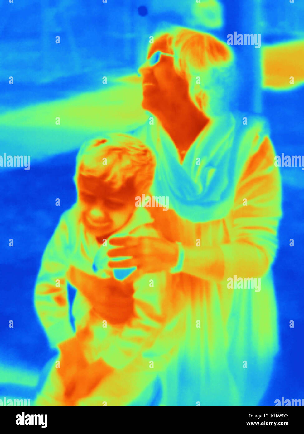 Thermal photograph of mother and son in park Stock Photo - Alamy