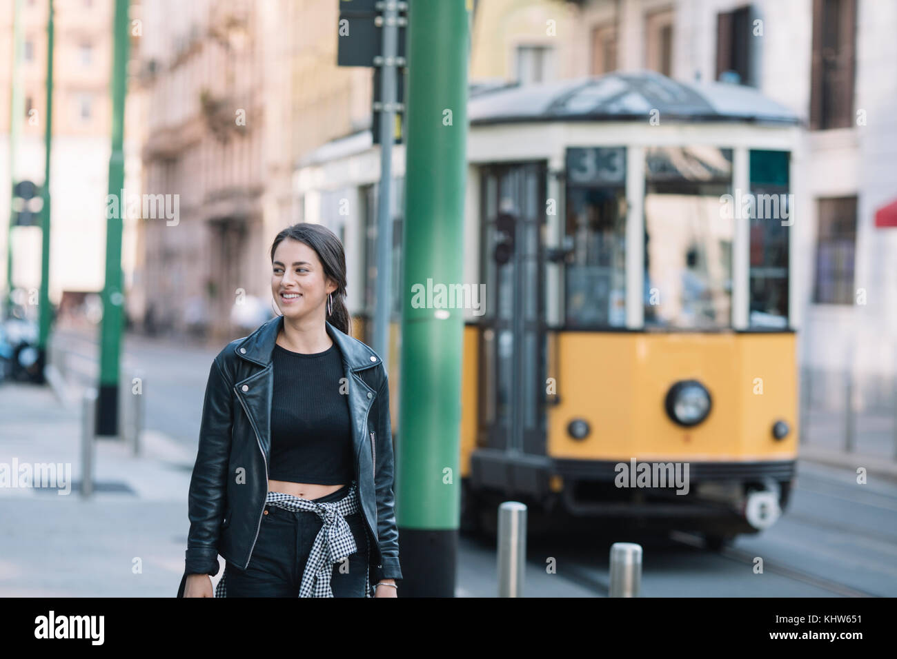 Woman walking street hi-res stock photography and images - Alamy
