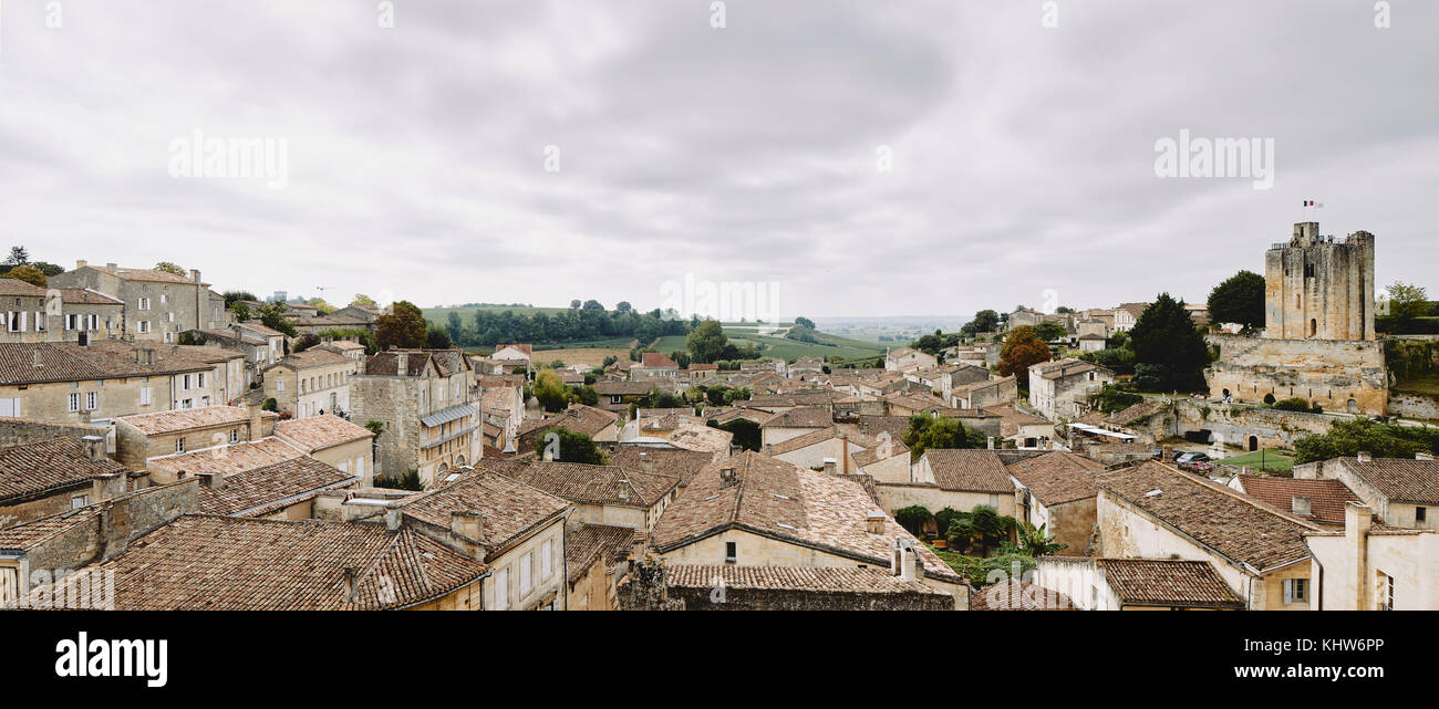 Elevated panoramic cityscape with rooftops and medieval buildings, Saint-Emilion, Aquitaine, France Stock Photo